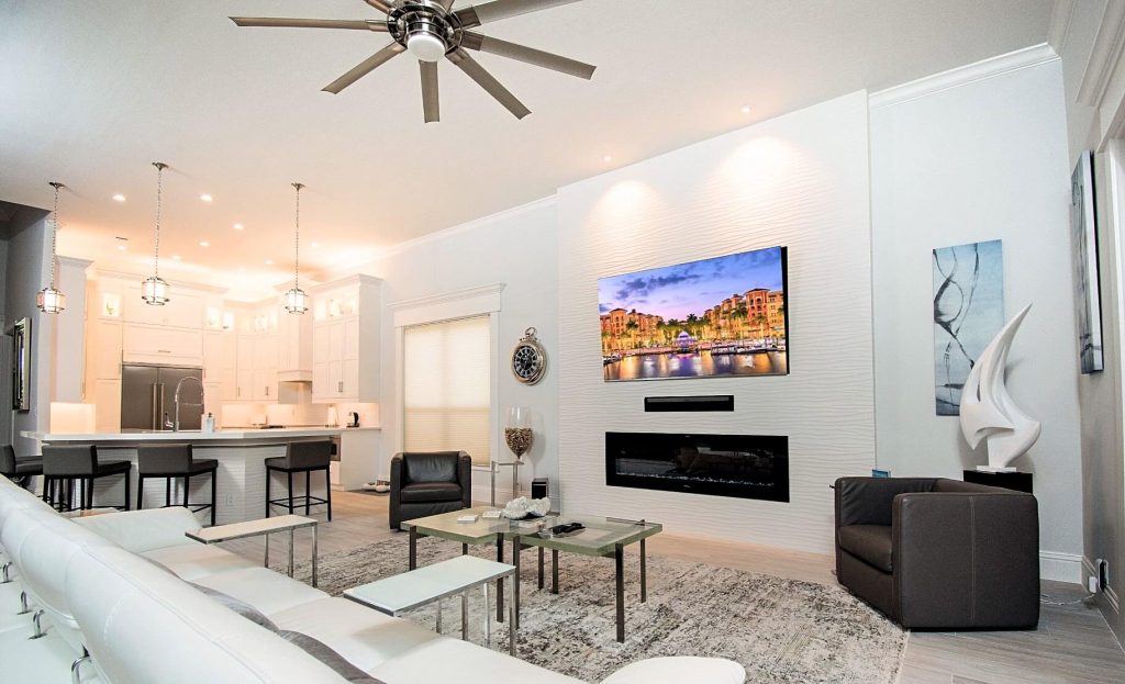 Whole-home renovation in Naples with open great room and kitchen